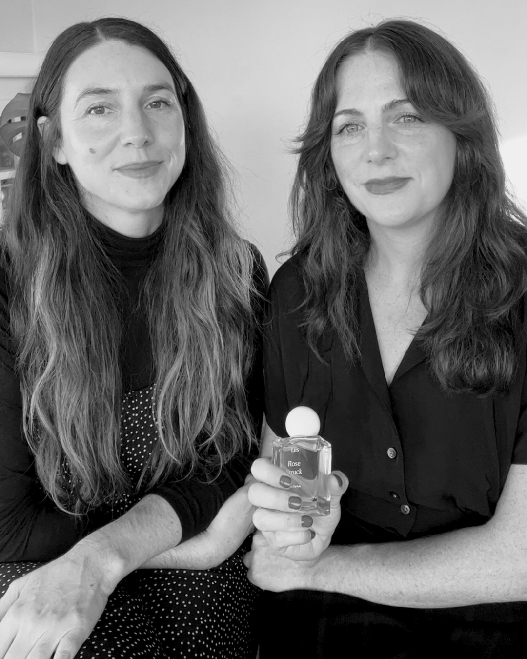 Liis Founders Alissa and Leslie with Eau de Parfum bottle