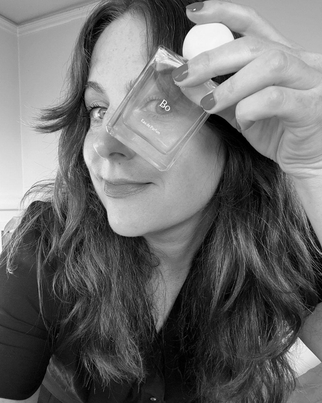 Liis Founder Alissa with Bo fragrance bottle