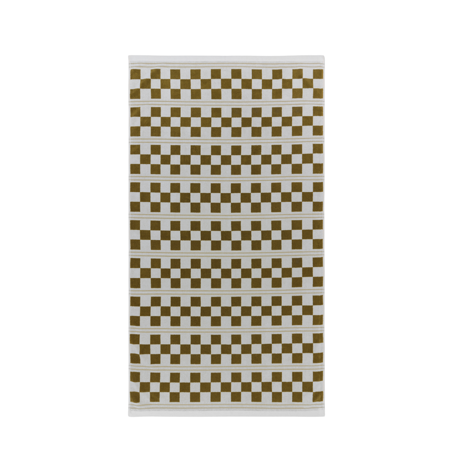 Towel with olive green and white squares on a white background